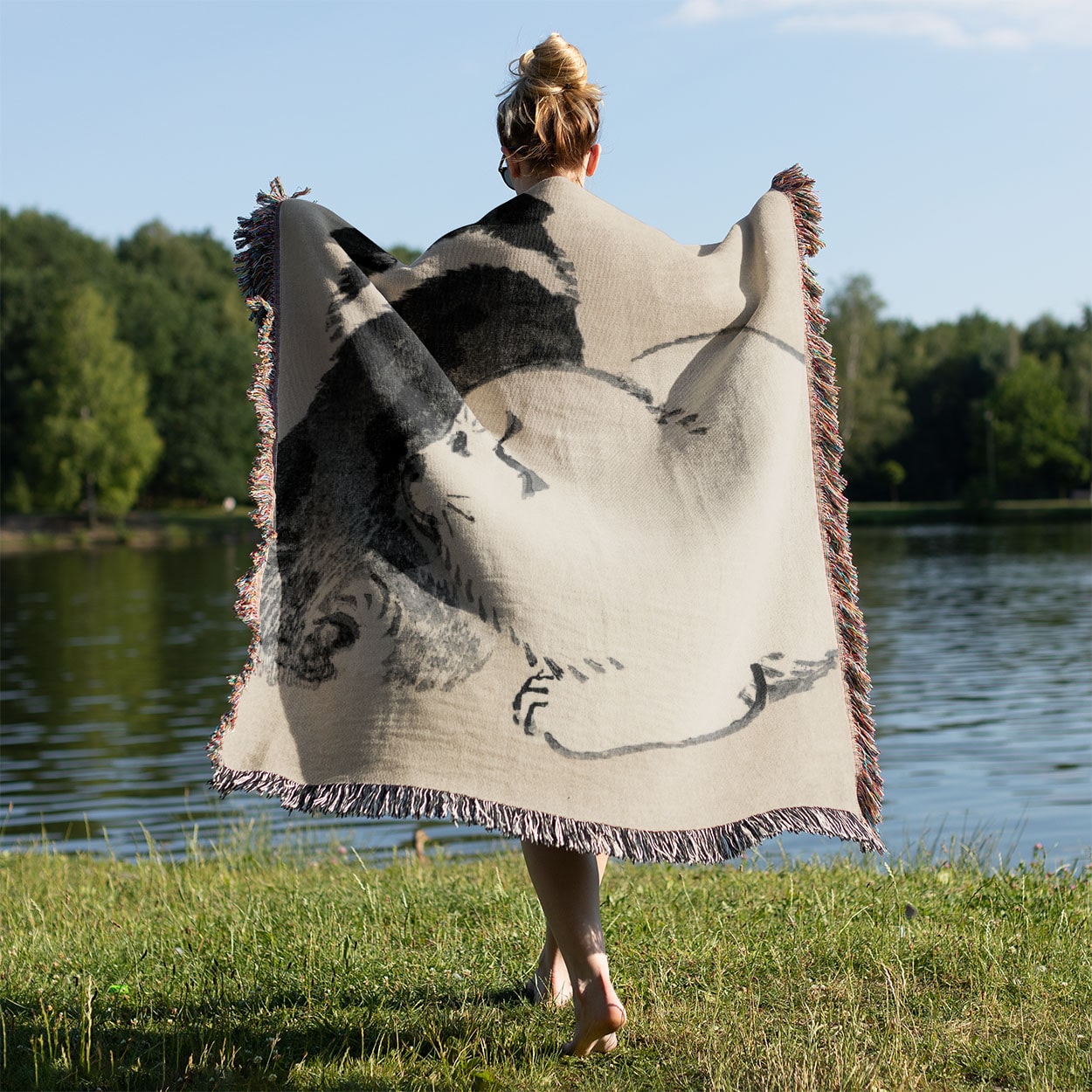 Cute Baby Animals Woven Blanket Held on a Woman's Back Outside