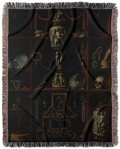 Cabinet of Curiosities woven throw blanket, crafted from 100% cotton, offering a soft and cozy texture with a dark academia theme for home decor.