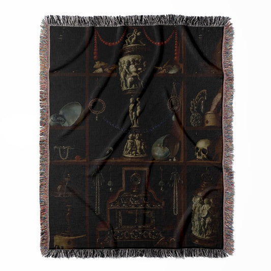 Cabinet of Curiosities woven throw blanket, crafted from 100% cotton, offering a soft and cozy texture with a dark academia theme for home decor.