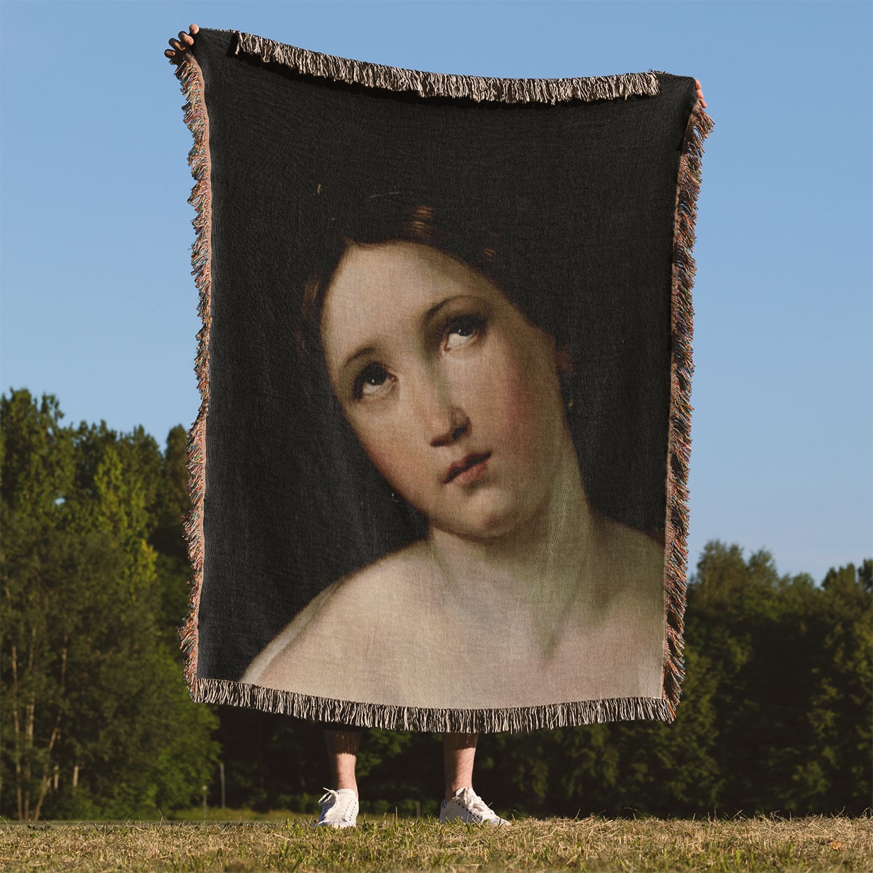 Dark Academia Woven Blanket Held Up Outside