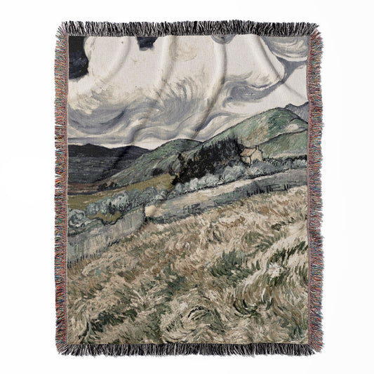 Dark Cloudy Hillside woven throw blanket, crafted from 100% cotton, offering a soft and cozy texture with a stormy theme for home decor.