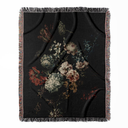 Dark Floral woven throw blanket, crafted from 100% cotton, delivering a soft and cozy texture with a dark still life flowers theme for home decor.