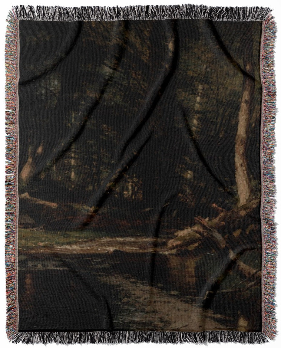 Dark Forest woven throw blanket, crafted from 100% cotton, delivering a soft and cozy texture with a dark nature theme for home decor.