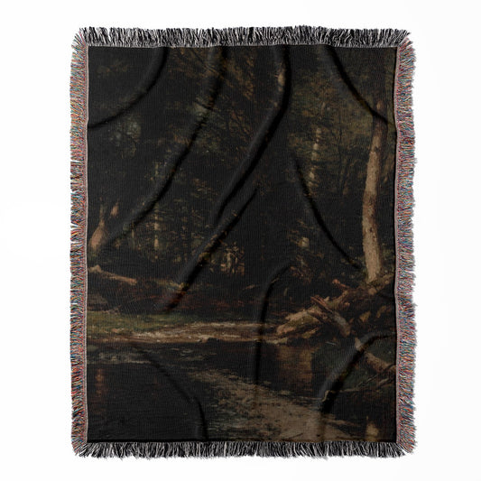 Dark Forest woven throw blanket, crafted from 100% cotton, delivering a soft and cozy texture with a dark nature theme for home decor.