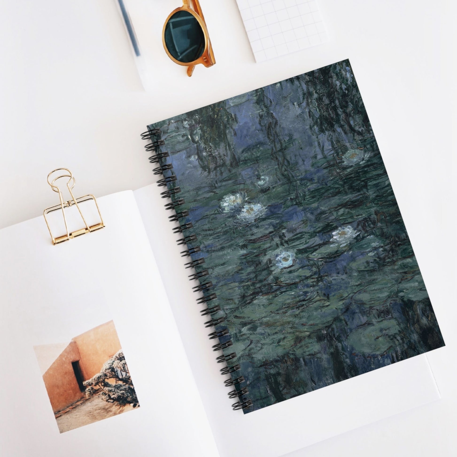 Deep Blue and Green Spiral Notebook Displayed on Desk