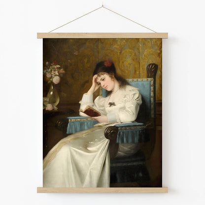 Concentrated Reading Art Print in Wood Hanger Frame on Wall