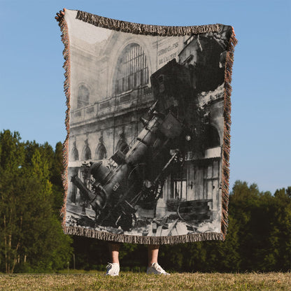 Disaster Woven Throw Blanket Held Up Outside