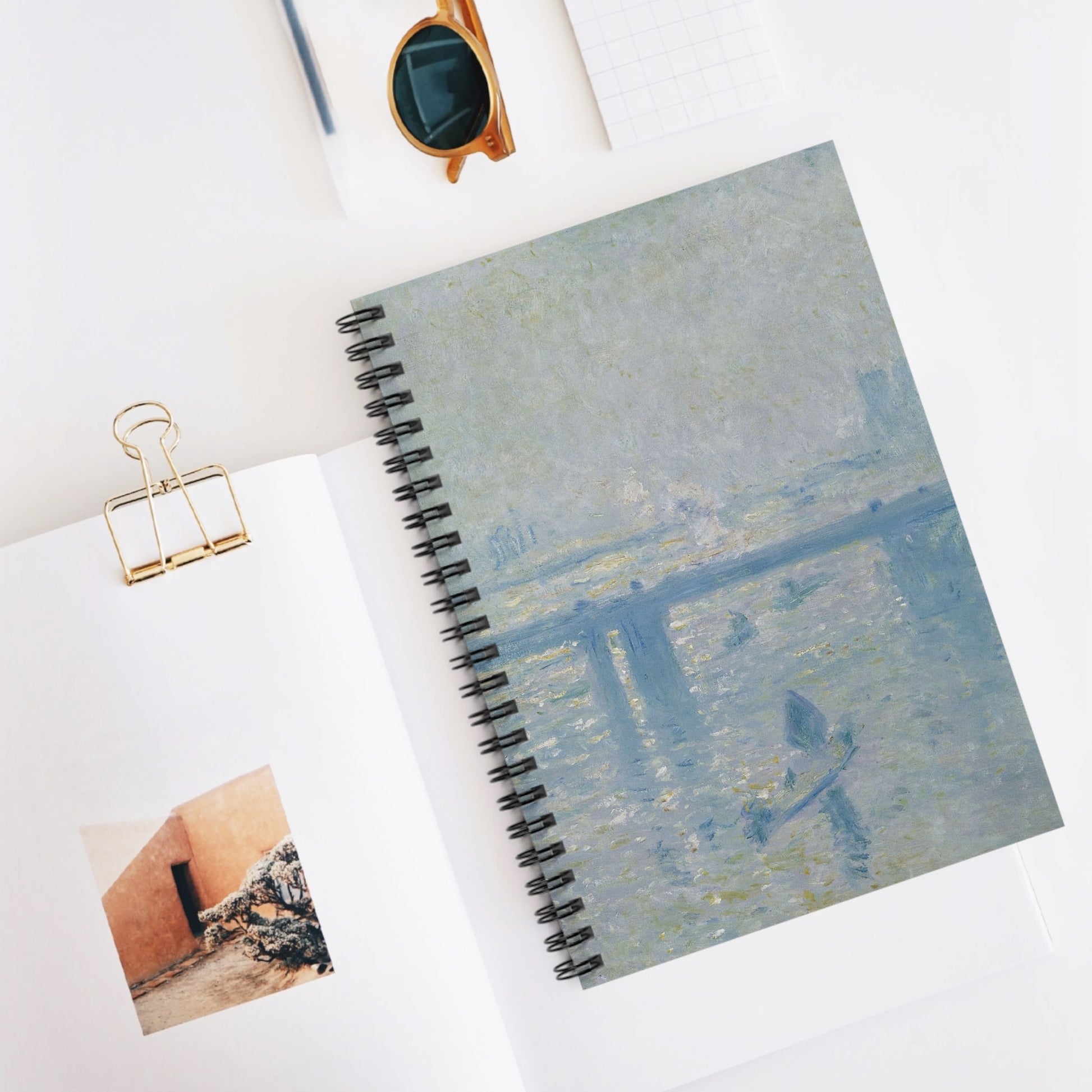 Dusty Light Blue Spiral Notebook Displayed on Desk