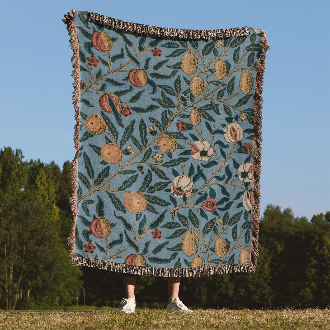 Eclectic Plants Woven Blanket Held Up Outside