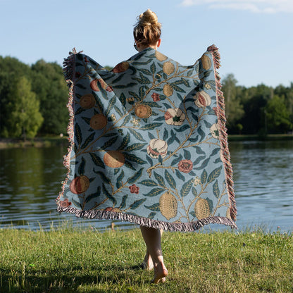 Eclectic Plants Woven Blanket Held on a Woman's Back Outside