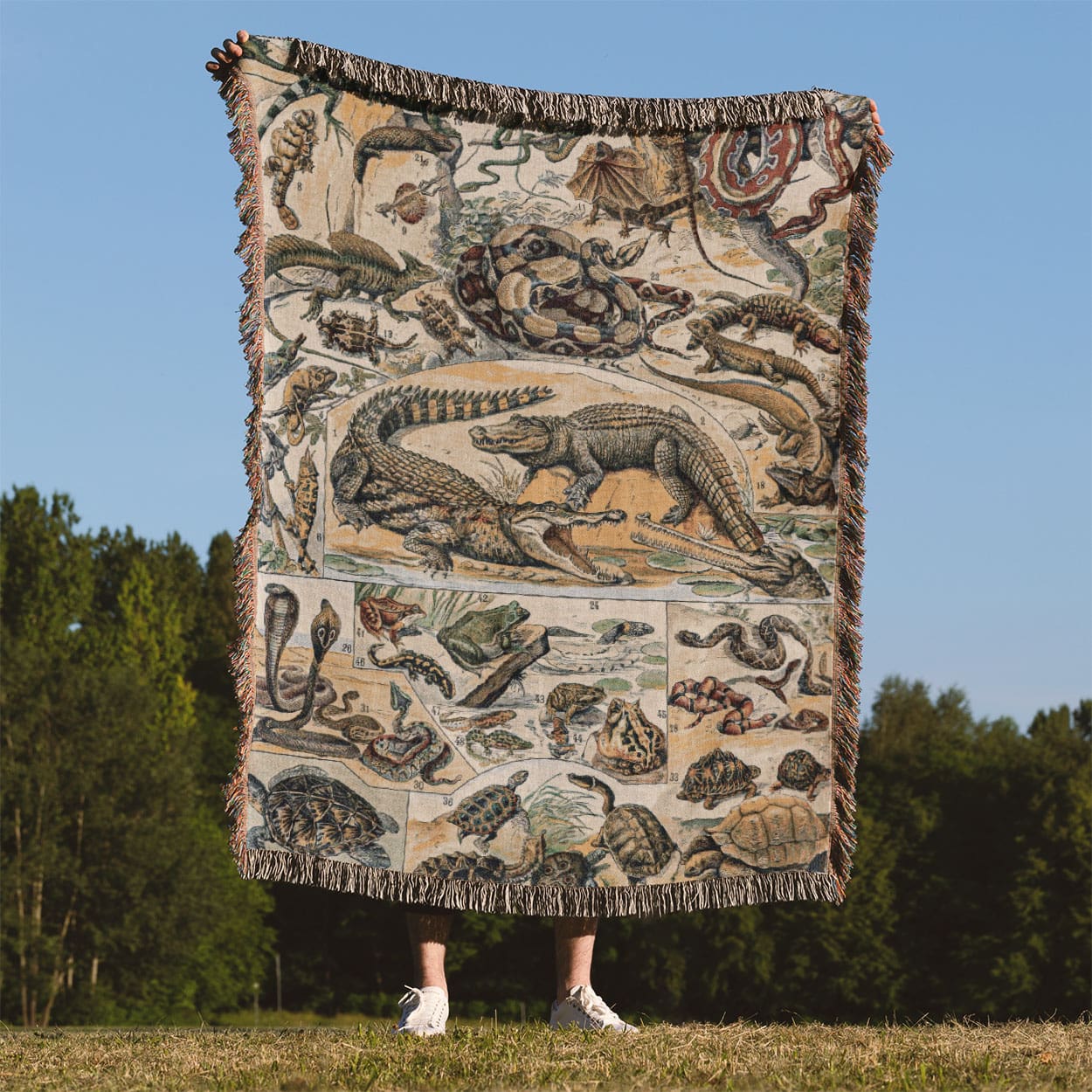Exotic Animals Woven Blanket Held Up Outside