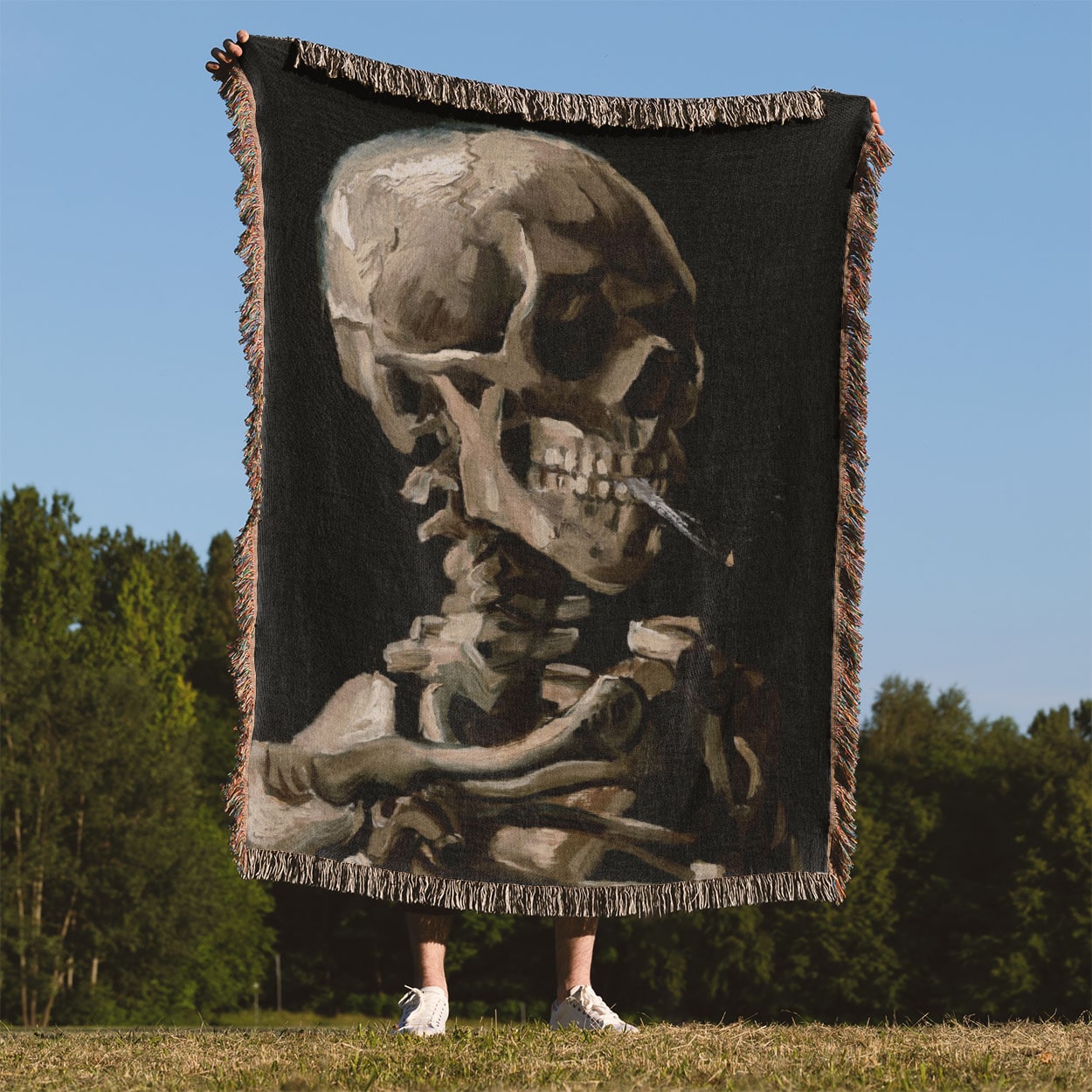 Famous Skull Woven Blanket Held Up Outside