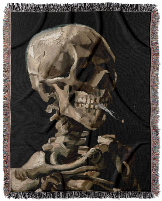 Van Gogh Skeleton woven throw blanket, made with 100% cotton, providing a soft and cozy texture with a burning cigarette design for home decor.