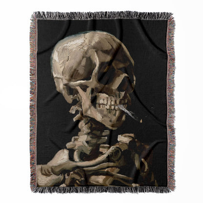 Van Gogh Skeleton woven throw blanket, made with 100% cotton, providing a soft and cozy texture with a burning cigarette design for home decor.