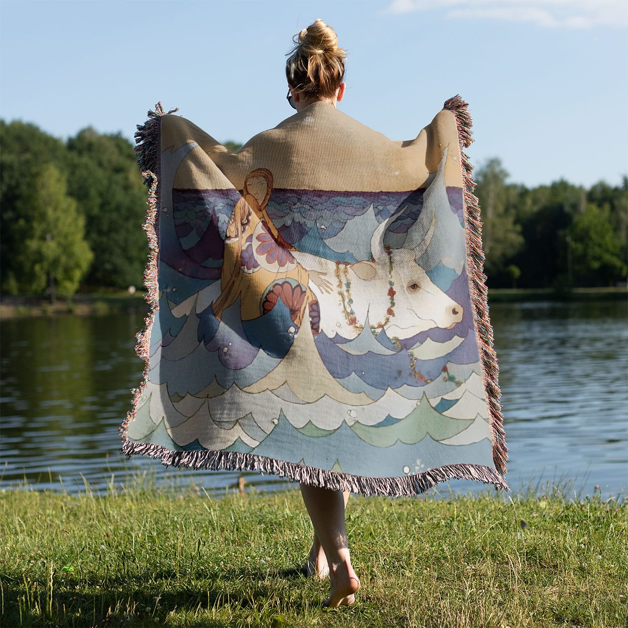 Fantasy Ocean Woven Blanket Held on a Woman's Back Outside