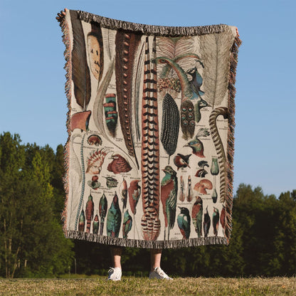 Feathers Woven Throw Blanket Held Up Outside