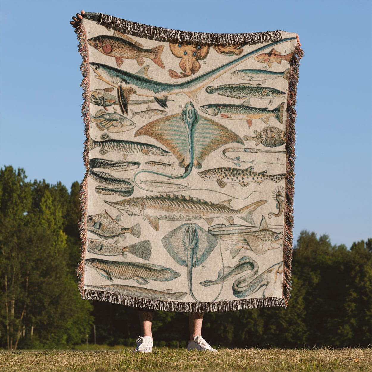 Fishing Woven Throw Blanket Held Up Outside