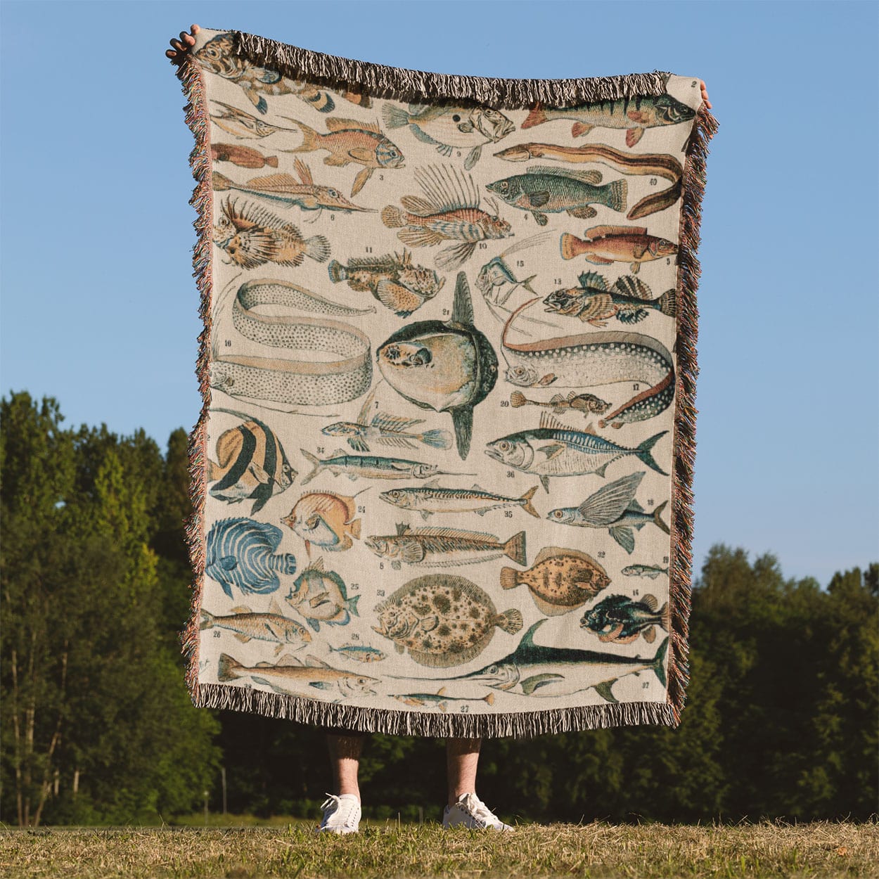 Fishing Woven Throw Blanket Held Up Outside