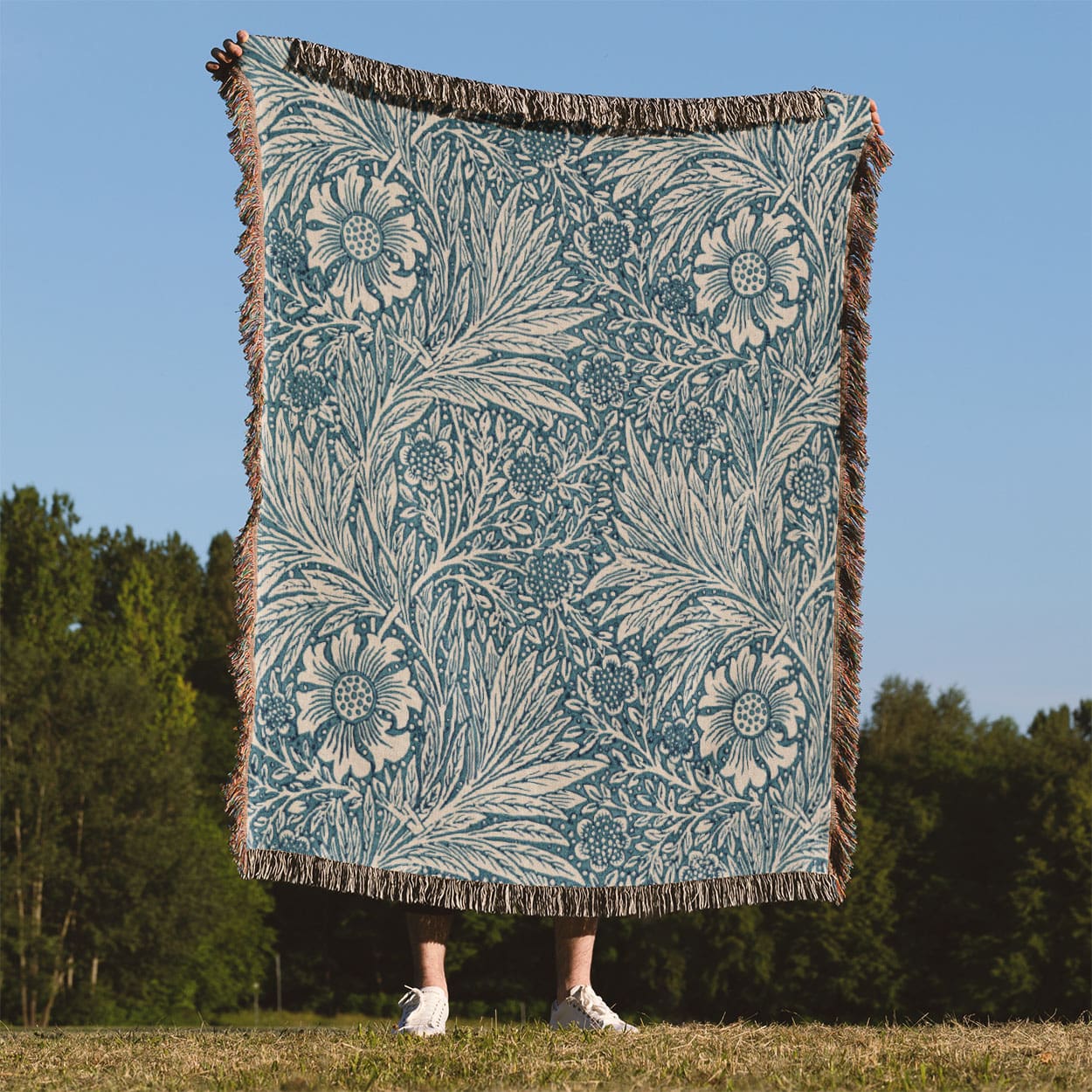 Floral Pattern Woven Blanket Held Up Outside