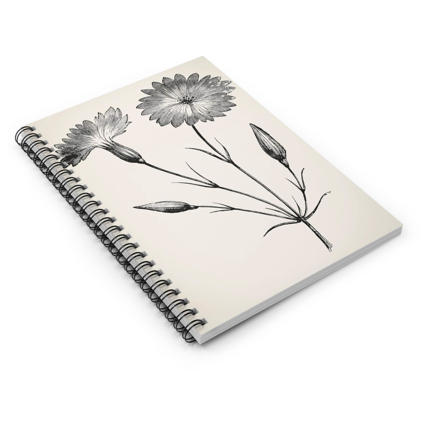 Floral Spiral Notebook Laying Flat on White Surface