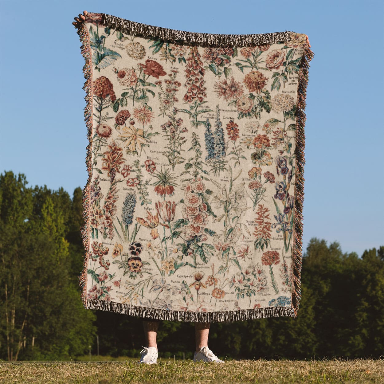 Flower Woven Blanket Held Up Outside