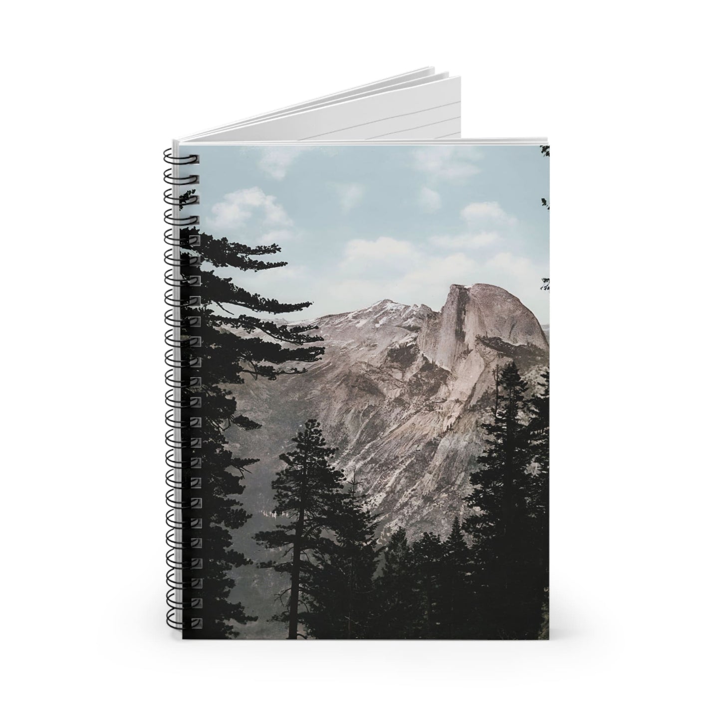 Forest and Mountains Spiral Notebook Standing up on White Desk