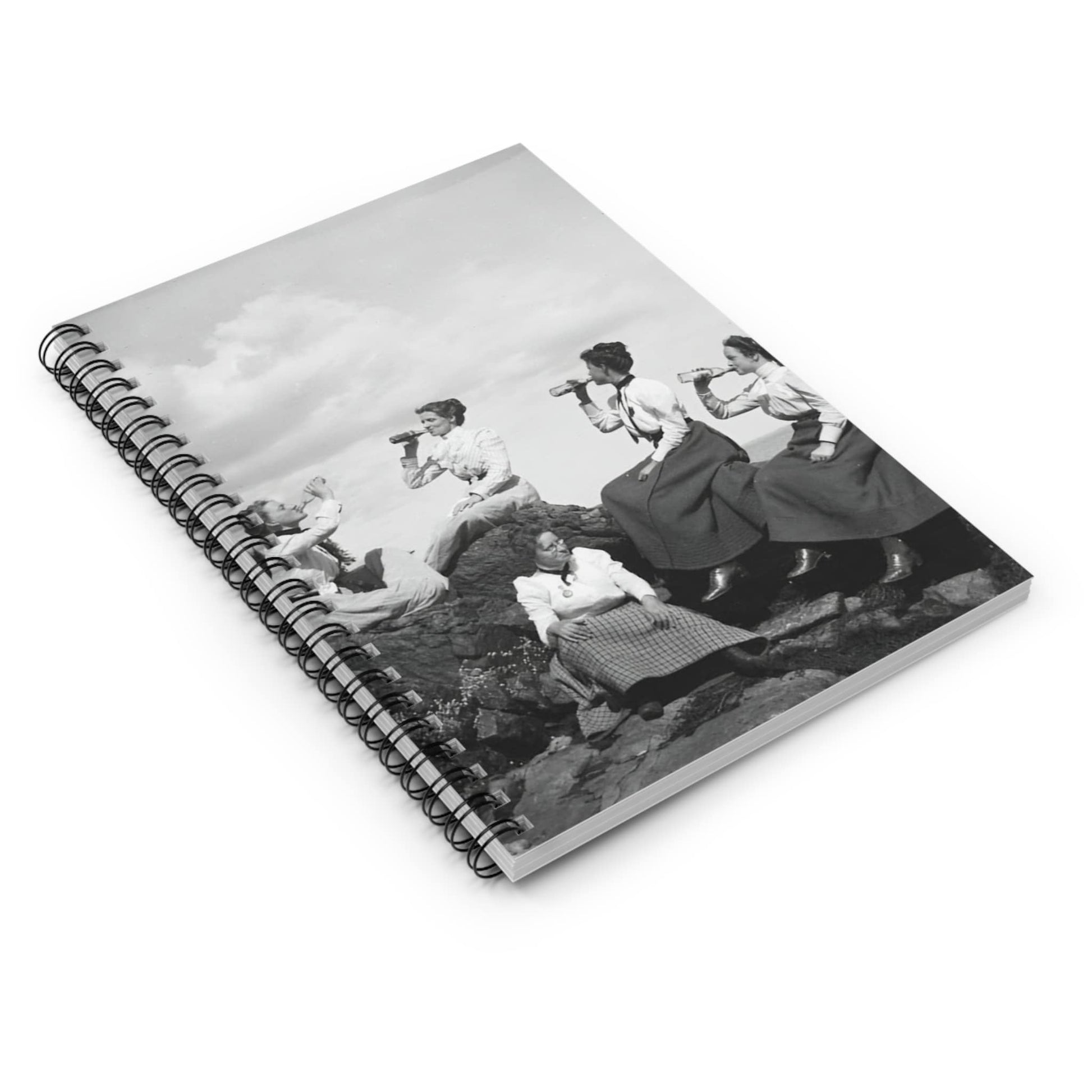 Fun College Spiral Notebook Laying Flat on White Surface