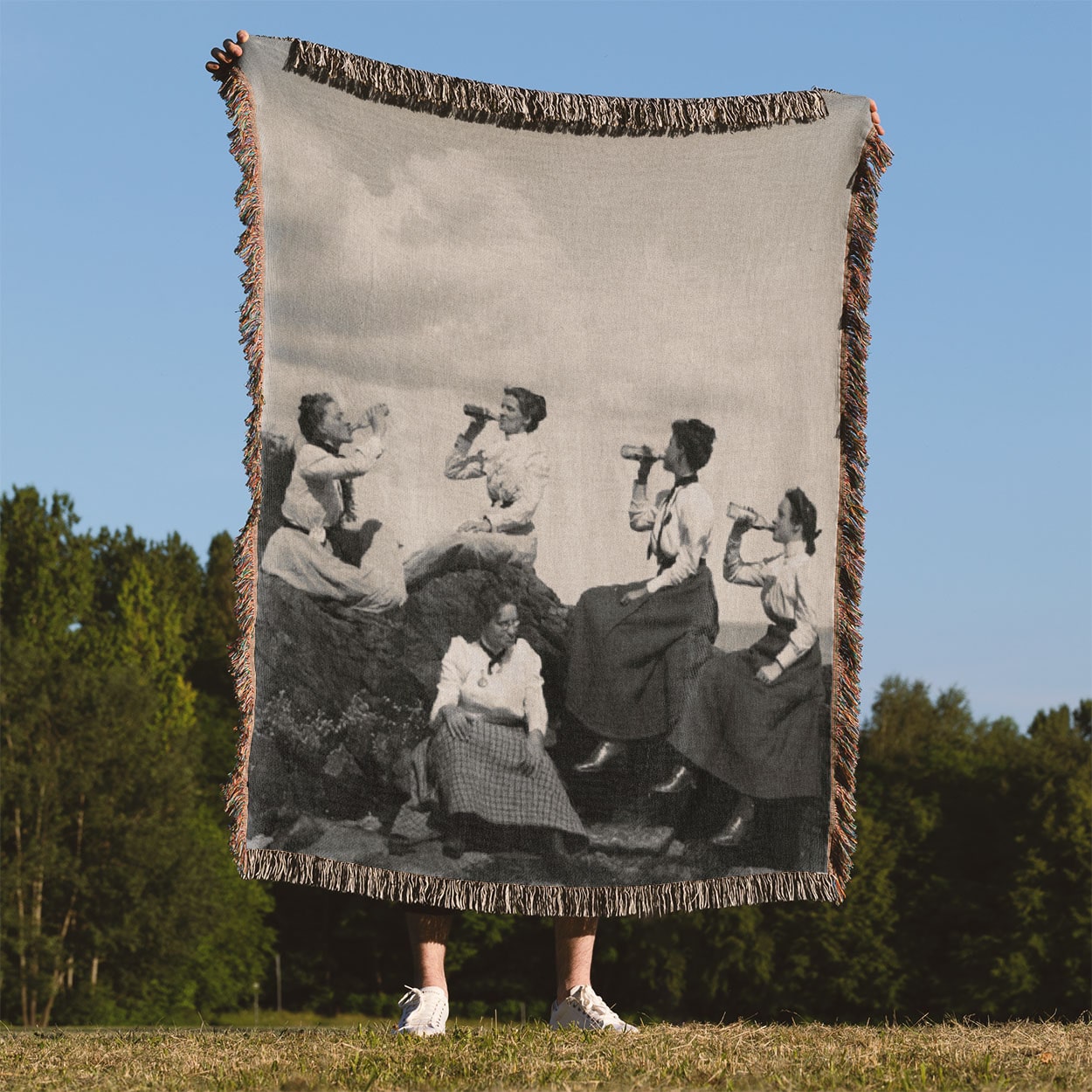 Fun College Woven Blanket Held Up Outside