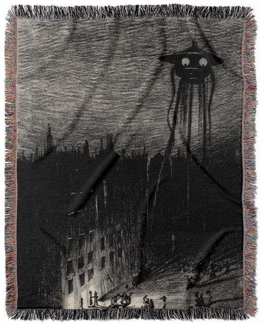 War of the Worlds woven throw blanket, made with 100% cotton, providing a soft and cozy texture with a funny alien drawing for home decor.