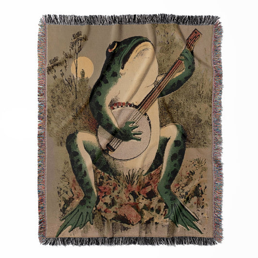 Funny Animal woven throw blanket, made of 100% cotton, featuring a soft and cozy texture with a frog playing the banjo for home decor.