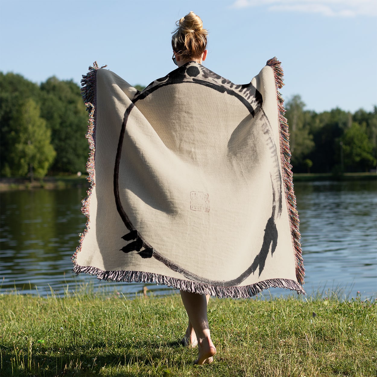 Funny Japanese Toad Woven Blanket Held on a Woman's Back Outside