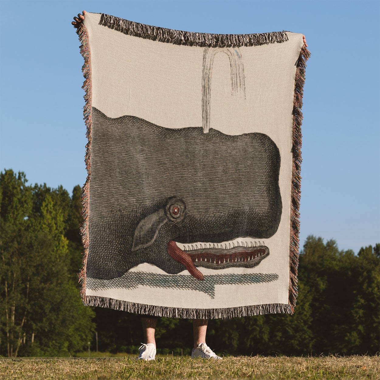 Funny Whale Woven Throw Blanket Held Up Outside