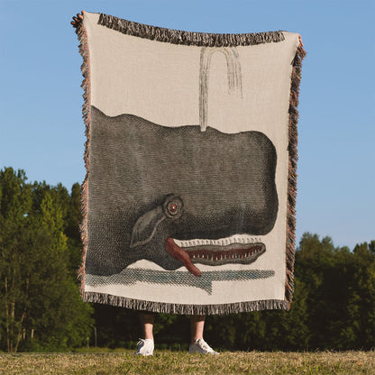 Funny Whale Woven Blanket Held Up Outside
