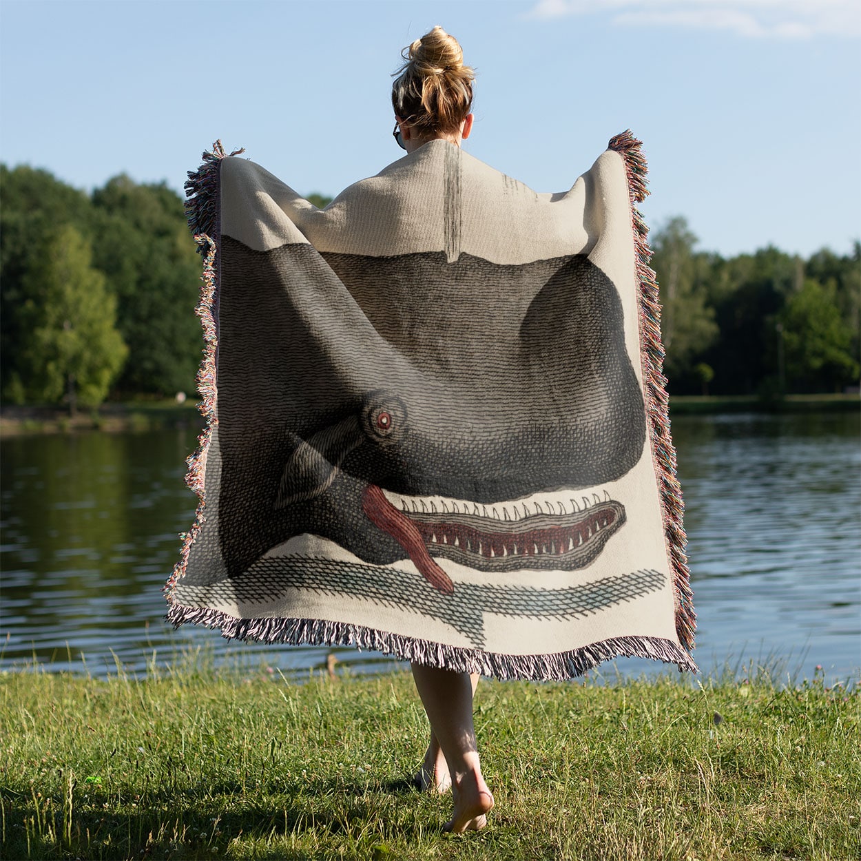 Funny Whale Woven Blanket Held on a Woman's Back Outside