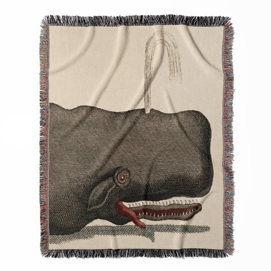 Funny Whale woven throw blanket, made of 100% cotton, offering a soft and cozy texture with a crazy gray whale design for home decor.