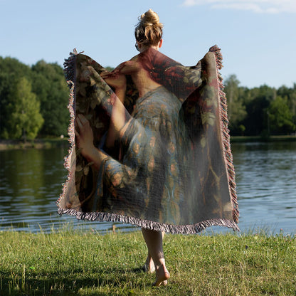 Garden Bliss Woven Throw Blanket Held on a Woman's Back Outside