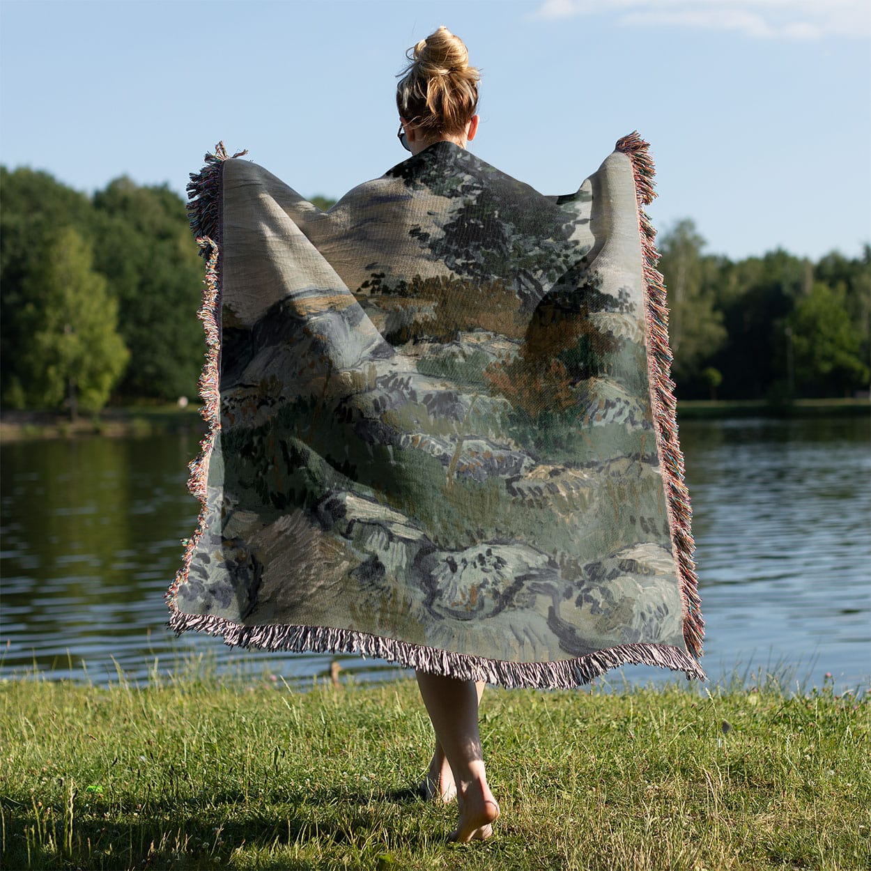 Green Aesthetic Landscape Woven Blanket Held on a Woman's Back Outside