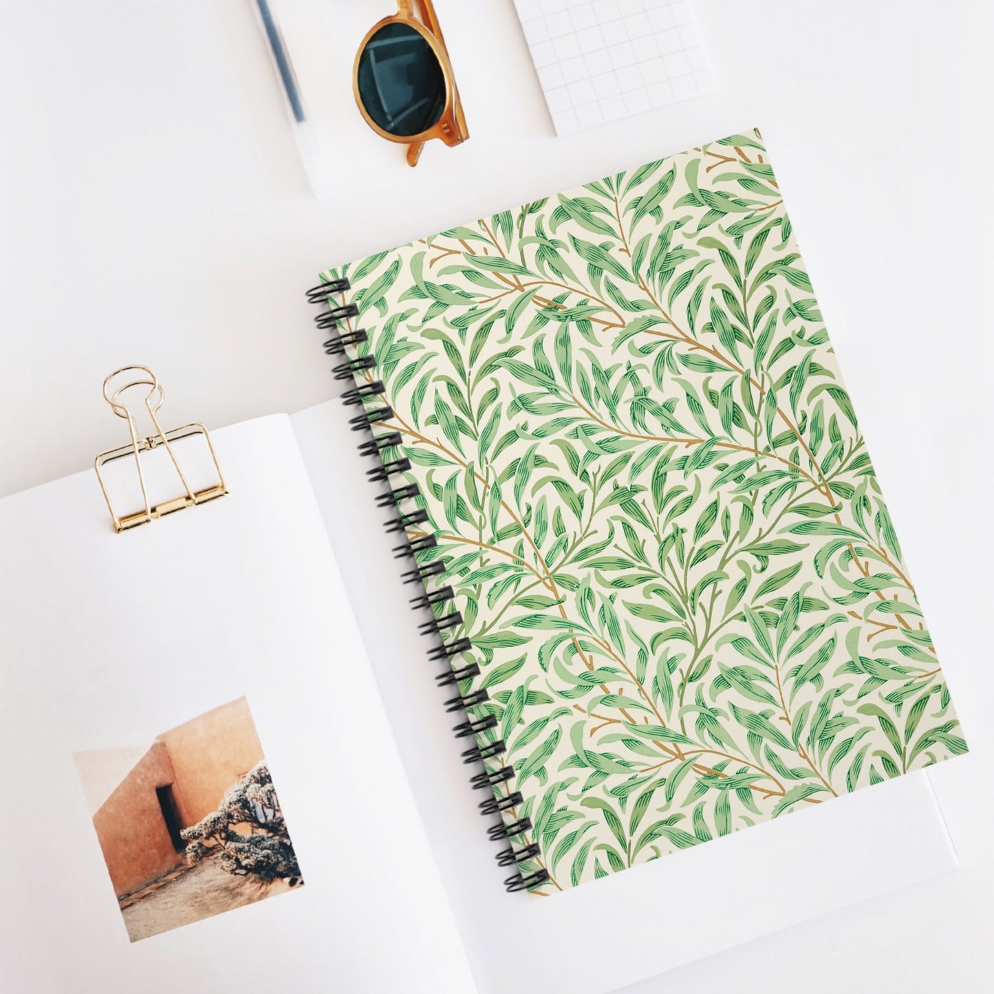 Green Leaf Spiral Notebook Displayed on Desk