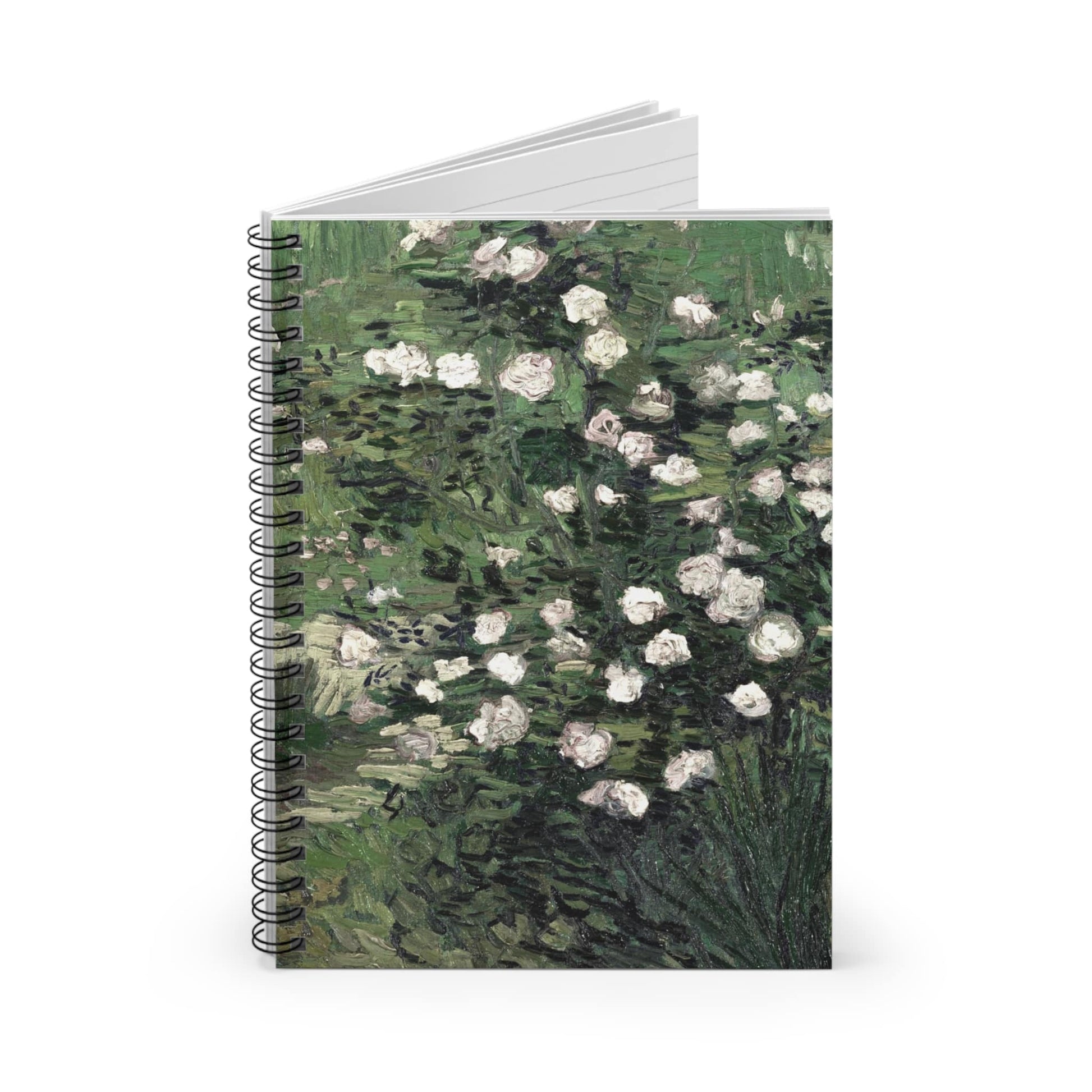 Green with White Flowers Spiral Notebook Standing up on White Desk