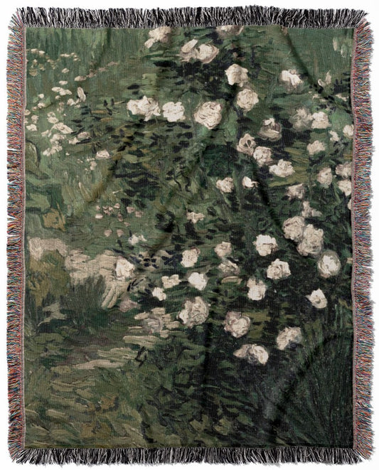 Green and White Floral woven throw blanket, made of 100% cotton, featuring a soft and cozy texture in an impressionist style for home decor.