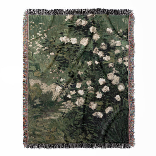 Green and White Floral woven throw blanket, made of 100% cotton, featuring a soft and cozy texture in an impressionist style for home decor.