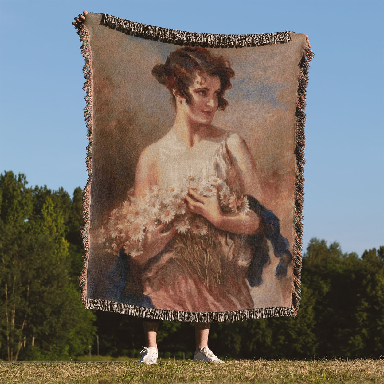 Hands Full of Flowers Woven Blanket Held Up Outside