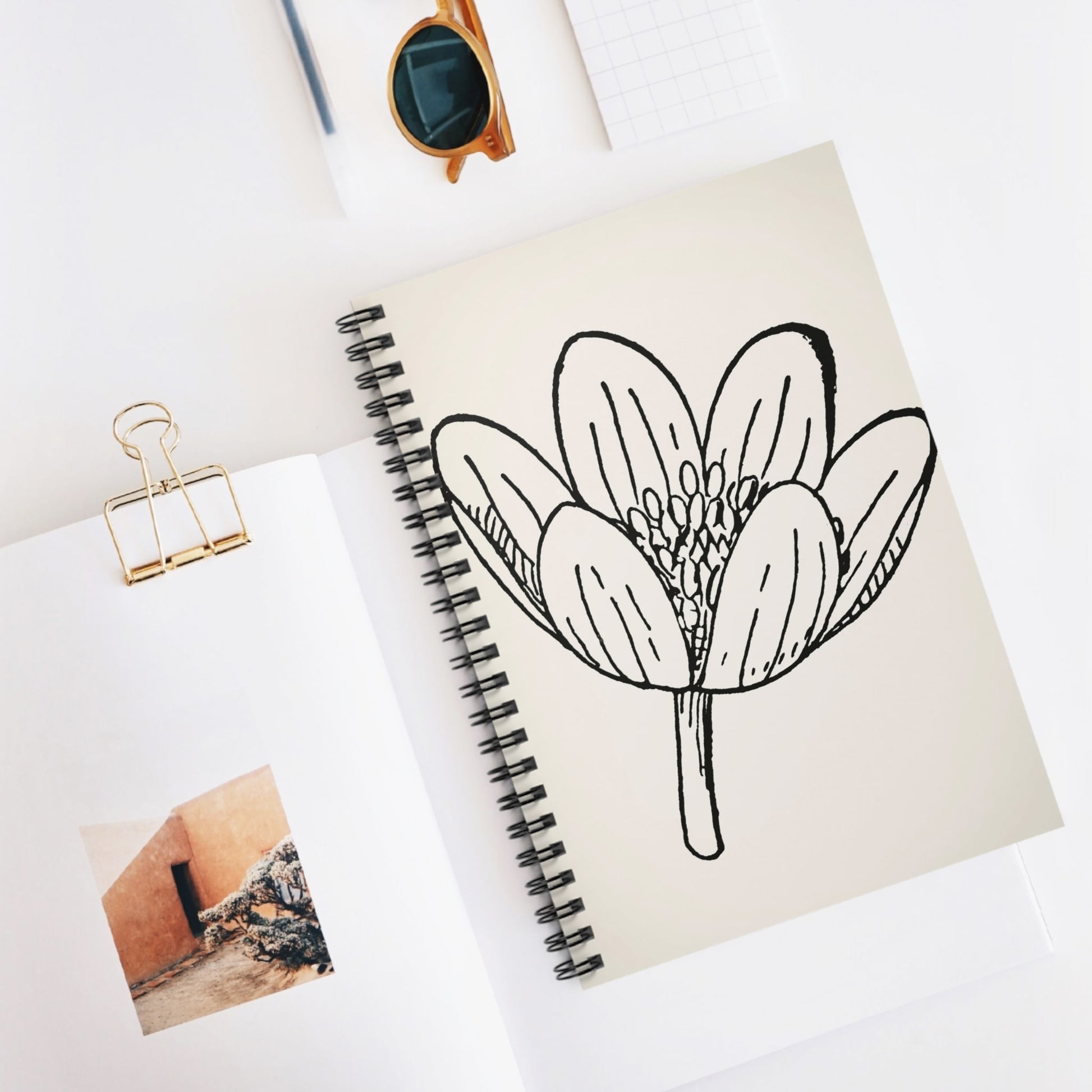 Happy Spiral Notebook Displayed on Desk