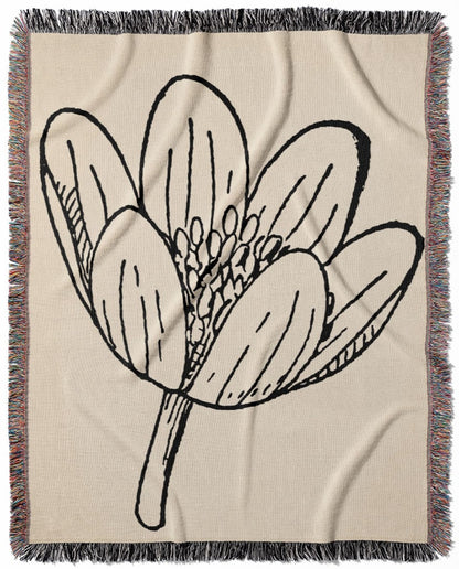 Minimalist Flower woven throw blanket, made with 100% cotton, providing a soft and cozy texture with a happy theme for home decor.