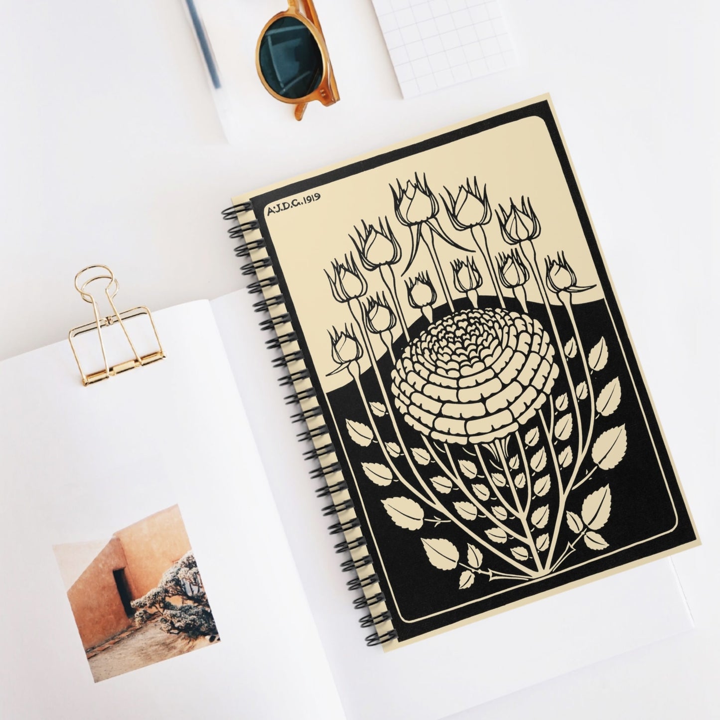 Ink Flower Aesthetic Spiral Notebook Displayed on Desk