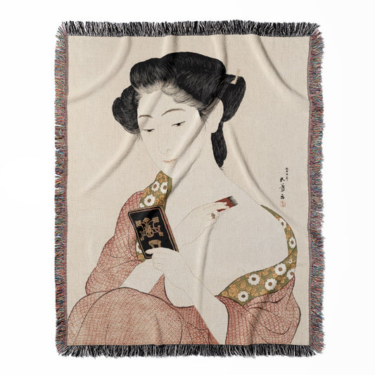 Japanese Aesthetic woven throw blanket, crafted from 100% cotton, providing a soft and cozy texture with a woman applying powder theme for home decor.