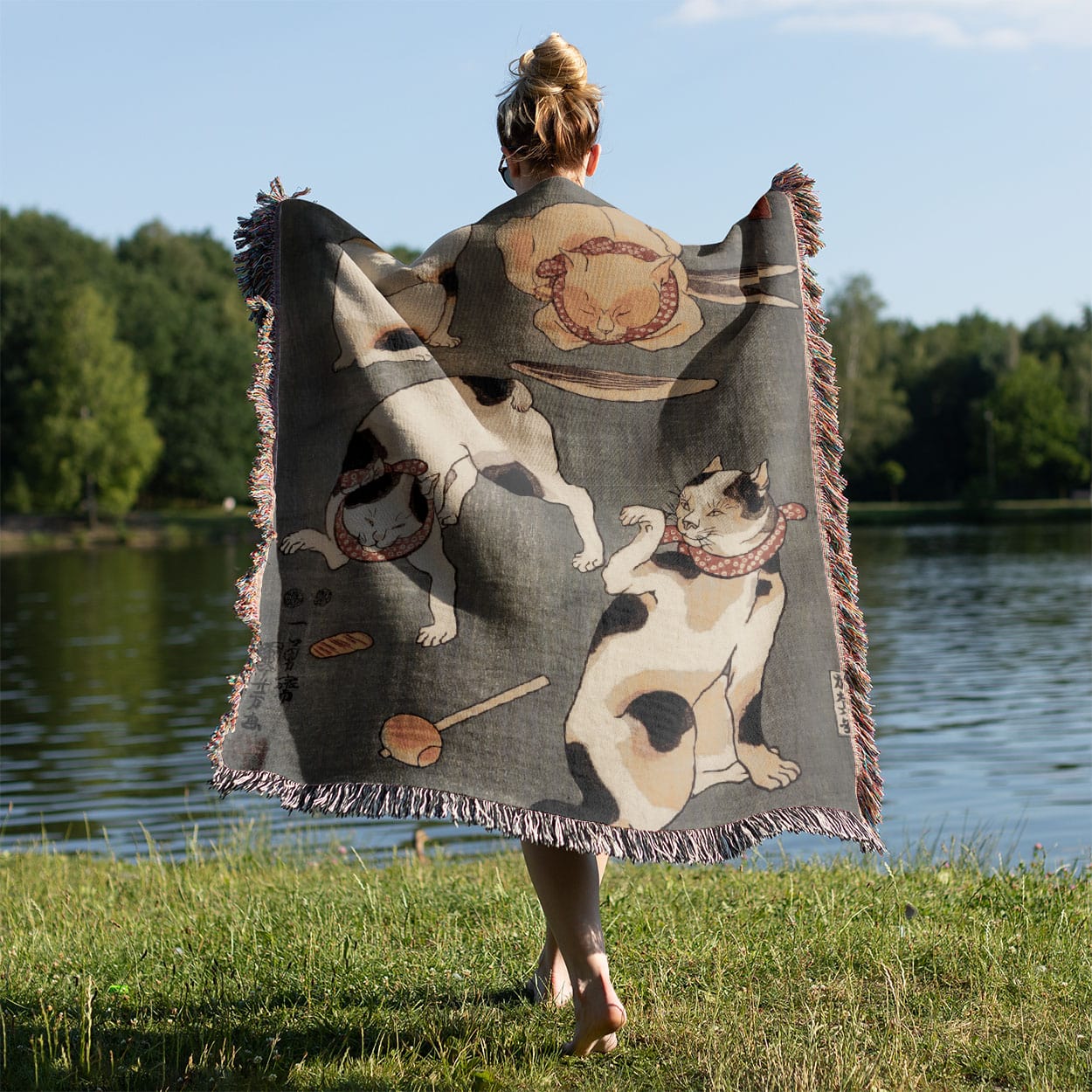 Japanese Cats Woven Blanket Held on a Woman's Back Outside