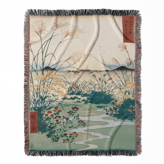 Japanese Spring Landscape woven throw blanket, crafted from 100% cotton, offering a soft and cozy texture with a mountains theme for home decor.