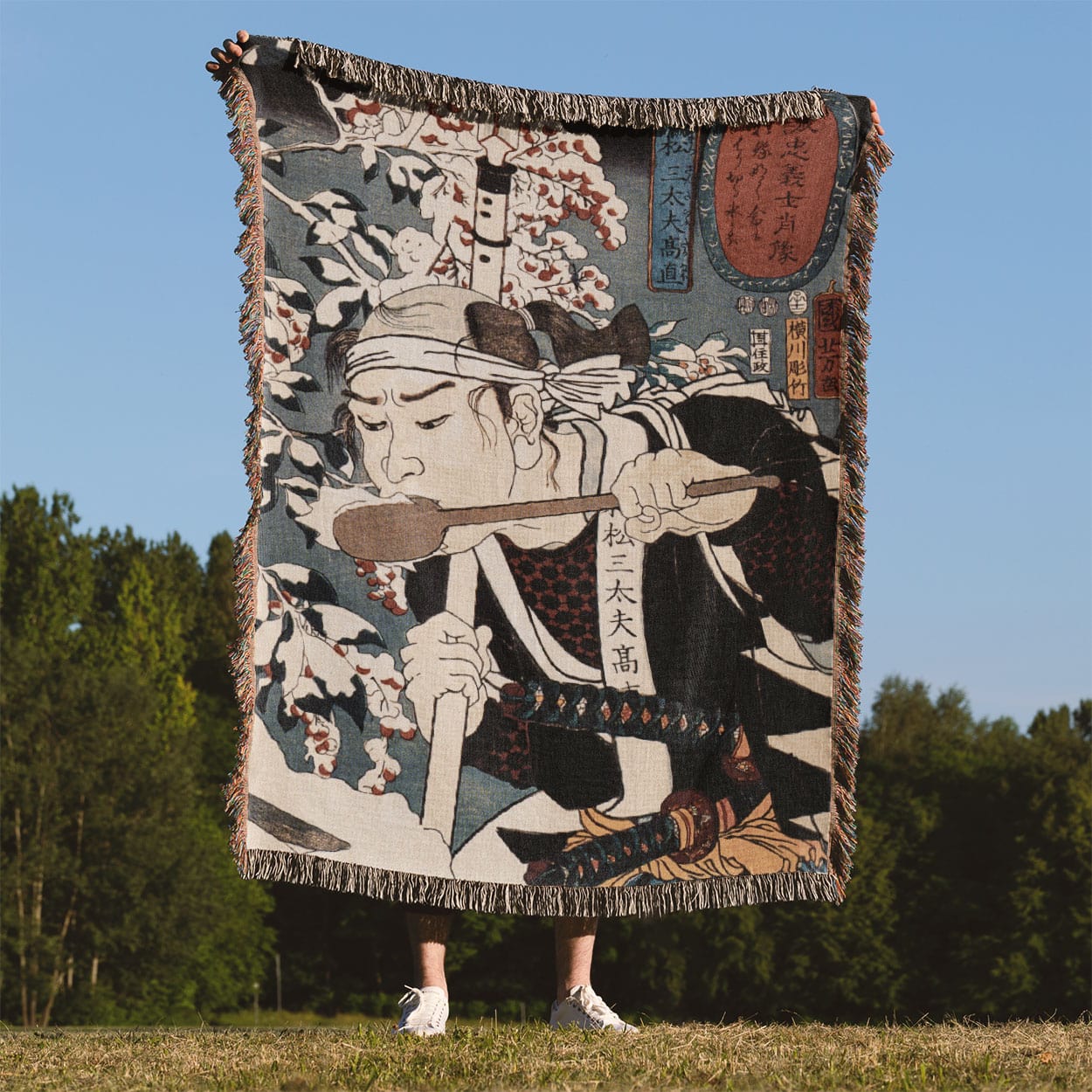 Japanese Warrior Woven Blanket Held Up Outside