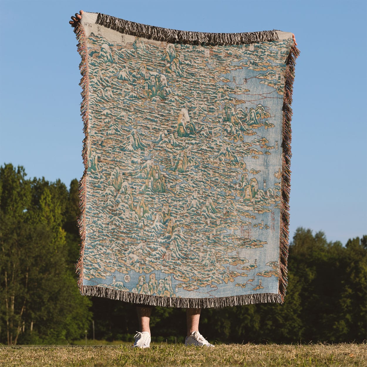 Japanese Woodblock Woven Throw Blanket Held Up Outside